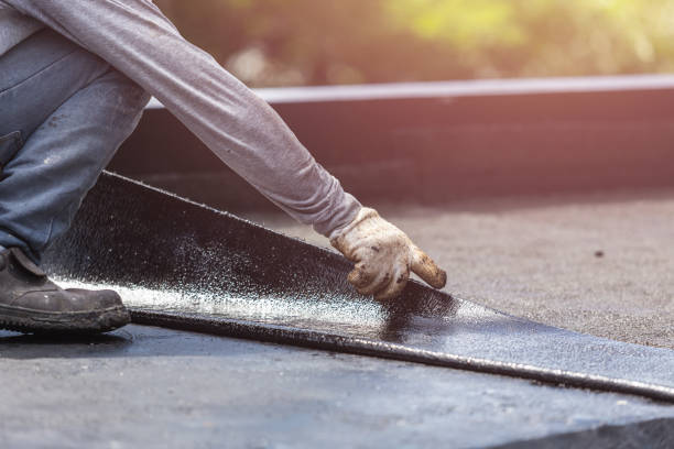 Professional Waterproofing technician working in Nichols, WI